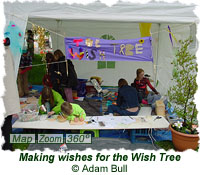 Making wishes to put on the Wishing Tree
