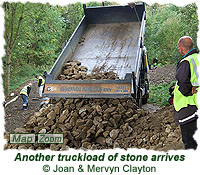 Another truckload of stone arrives