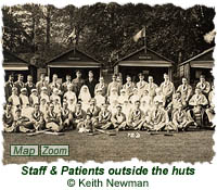 Staff & patients outside the huts